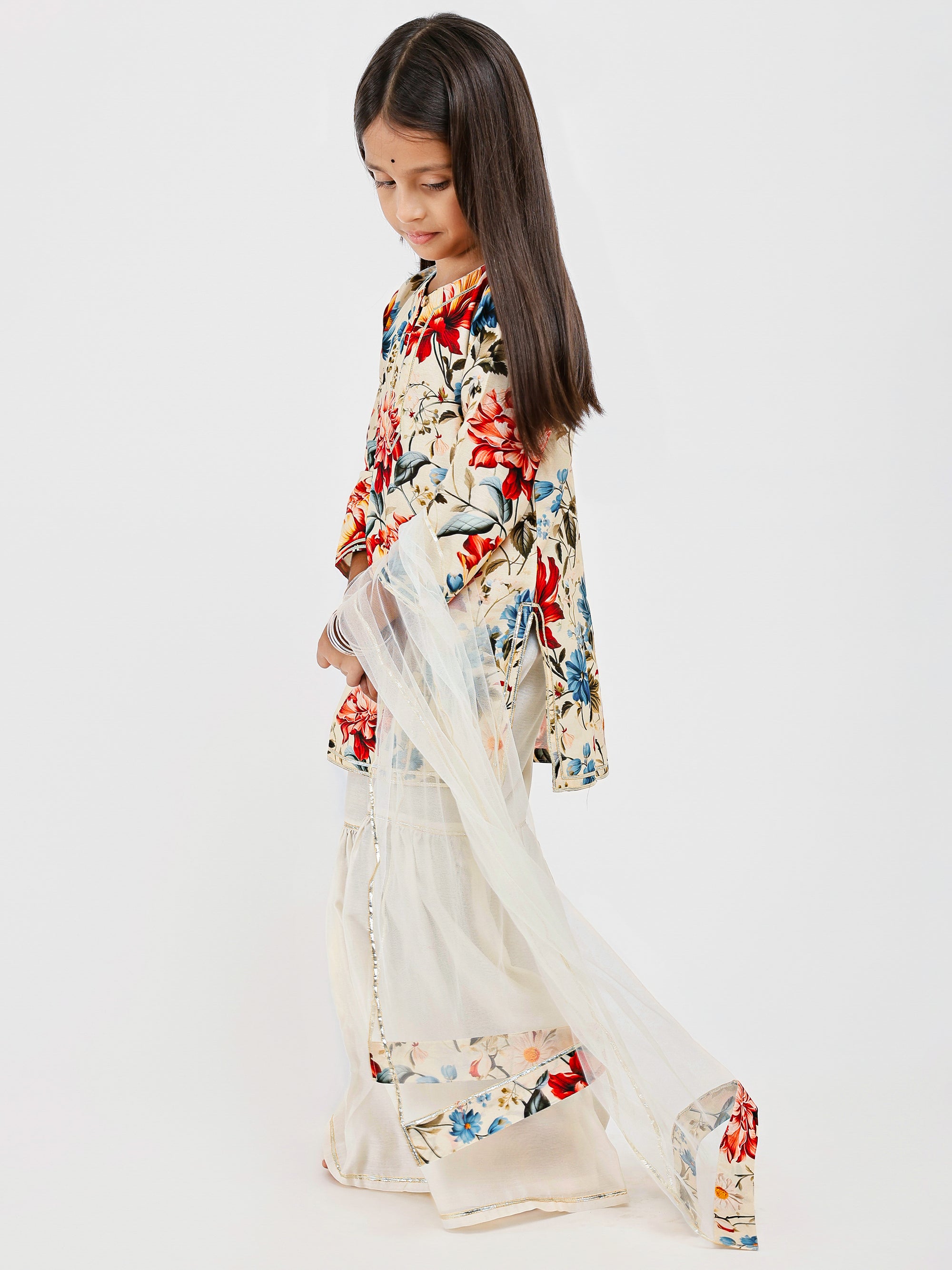Model wearing Ivory Floral Sharara Set